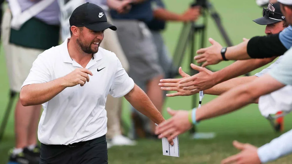 Alex Fitzpatrick of England reacts with fans as he walks to the 18th hole tee box during the third round of the Truist Championship 2026 at Quail Hollow Country Club on May 09, 2026 in Charlotte, North Carolina. (Photo by Andrew Redington/Getty Images)